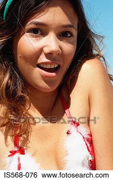 Stock Photo - woman in fluffy 
bikini top. fotosearch 
- search stock 
photos, pictures, 
images, and photo 
clipart