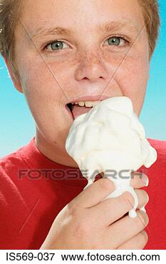 Picture - boy enjoying a 
big ice cream. 
fotosearch - search 
stock photos, 
pictures, images, 
and photo clipart