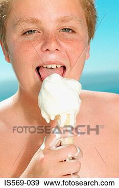 Stock Photograph - boy enjoying a 
big ice cream. 
fotosearch - search 
stock photos, 
pictures, images, 
and photo clipart