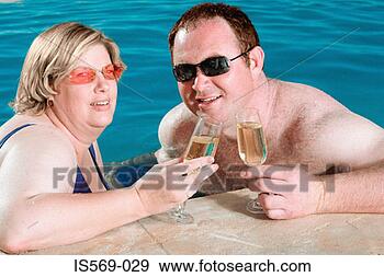 Stock Photograph - couple enjoying 
themselves. fotosearch 
- search stock 
photos, pictures, 
images, and photo 
clipart
