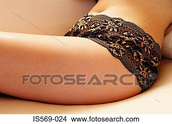 Stock Photo - curvaceous woman 
in underwear. 
fotosearch - search 
stock photos, 
pictures, images, 
and photo clipart