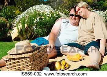 Stock Photo - happy couple having 
a picnic. fotosearch 
- search stock 
photos, pictures, 
images, and photo 
clipart