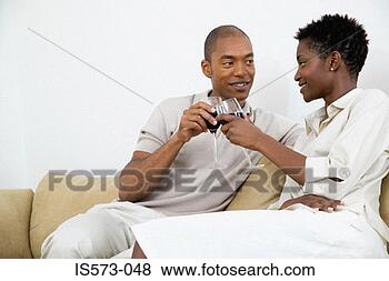 Stock Photo - couple toasting. 
fotosearch - search 
stock photos, 
pictures, images, 
and photo clipart