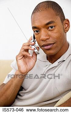 Stock Photo - man using cellular 
telephone. fotosearch 
- search stock 
photos, pictures, 
images, and photo 
clipart