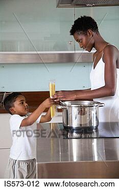 Stock Photo - mother and son 
in kitchen. fotosearch 
- search stock 
photos, pictures, 
images, and photo 
clipart