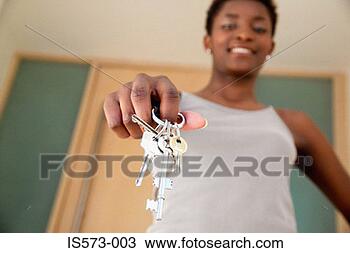 Stock Photo - woman holding 
bunch of keys. 
fotosearch - search 
stock photos, 
pictures, images, 
and photo clipart