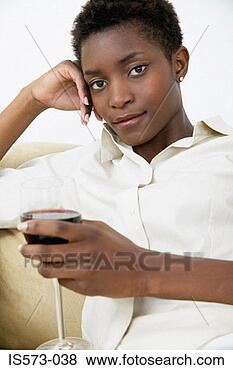 Stock Photo - woman holding 
glass of red wine. 
fotosearch - search 
stock photos, 
pictures, images, 
and photo clipart