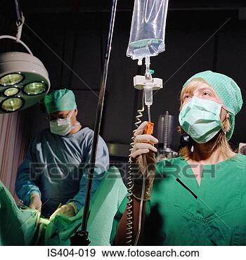 Stock Photograph - nurse monitoring 
fluids. fotosearch 
- search stock 
photos, pictures, 
images, and photo 
clipart