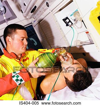 Stock Image - patient receiving 
oxygen. fotosearch 
- search stock 
photos, pictures, 
images, and photo 
clipart