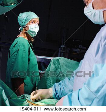Stock Photography - surgical team 
with patient. 
fotosearch - search 
stock photos, 
pictures, images, 
and photo clipart