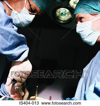 Stock Photo - surgical team 
with patient. 
fotosearch - search 
stock photos, 
pictures, images, 
and photo clipart