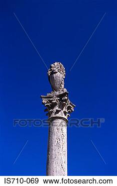 Stock Photograph - lion statue on 
column. fotosearch 
- search stock 
photos, pictures, 
images, and photo 
clipart