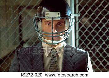 Stock Photography - businessman wearing 
american football 
helmet. fotosearch 
- search stock 
photos, pictures, 
images, and photo 
clipart