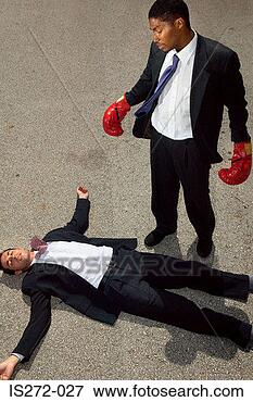 Picture - two businessmen 
boxing. fotosearch 
- search stock 
photos, pictures, 
images, and photo 
clipart
