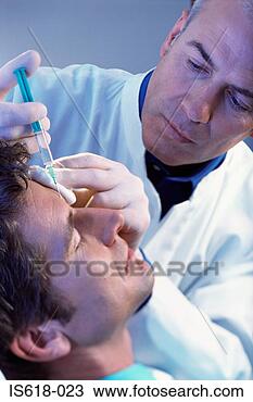 Stock Photo - man having botox 
® injections. 
fotosearch - search 
stock photos, 
pictures, images, 
and photo clipart