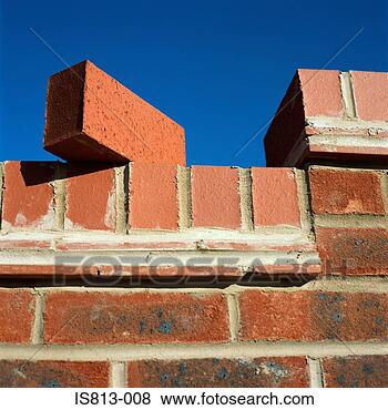 Stock Photo - brick balancing 
on wall. fotosearch 
- search stock 
photos, pictures, 
images, and photo 
clipart