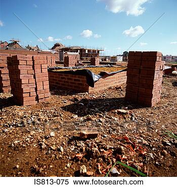 Stock Image - stacked bricks 
on construction 
site. fotosearch 
- search stock 
photos, pictures, 
images, and photo 
clipart