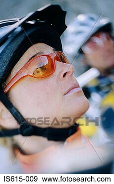 Stock Photograph - profile of female 
cyclist. fotosearch 
- search stock 
photos, pictures, 
images, and photo 
clipart
