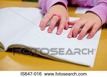 Stock Photo - blind girl reading 
braille. fotosearch 
- search stock 
photos, pictures, 
images, and photo 
clipart