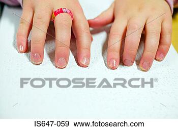 Stock Photograph - blind girl reading 
braille. fotosearch 
- search stock 
photos, pictures, 
images, and photo 
clipart
