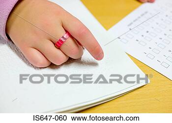 Stock Photography - blind girl reading 
braille. fotosearch 
- search stock 
photos, pictures, 
images, and photo 
clipart