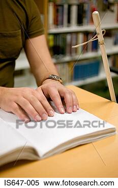 Stock Image - young man reading 
braille. fotosearch 
- search stock 
photos, pictures, 
images, and photo 
clipart