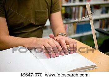 Stock Photography - young man reading 
braille. fotosearch 
- search stock 
photos, pictures, 
images, and photo 
clipart