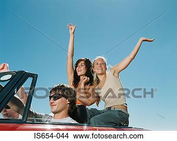 Stock Photo - friends enjoying 
road trip. fotosearch 
- search stock 
photos, pictures, 
images, and photo 
clipart