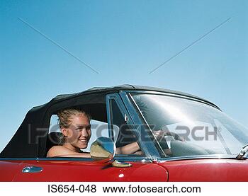Stock Photo - young woman in 
red car. fotosearch 
- search stock 
photos, pictures, 
images, and photo 
clipart