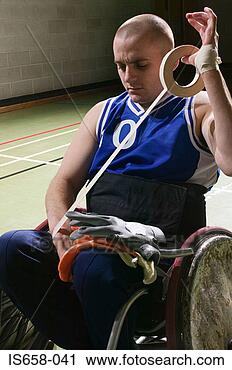 Stock Photography - basketball player 
bandaging his 
arm. fotosearch 
- search stock 
photos, pictures, 
images, and photo 
clipart