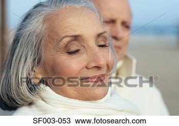 Stock Photo - senior couple 
at the beach. 
fotosearch - search 
stock photos, 
pictures, images, 
and photo clipart