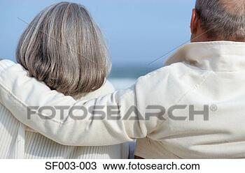 Stock Photo - senior man with 
arm around senior 
woman. fotosearch 
- search stock 
photos, pictures, 
images, and photo 
clipart