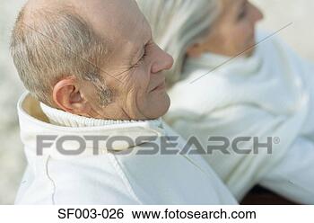 Stock Photo - senior in white 
couple looking 
away. fotosearch 
- search stock 
photos, pictures, 
images, and photo 
clipart