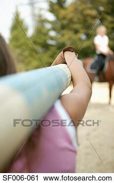 Stock Photography - two people with 
a horse. fotosearch 
- search stock 
photos, pictures, 
images, and photo 
clipart