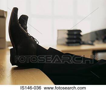 Stock Photo - businessman with 
feet on desk. 
fotosearch - search 
stock photos, 
pictures, images, 
and photo clipart