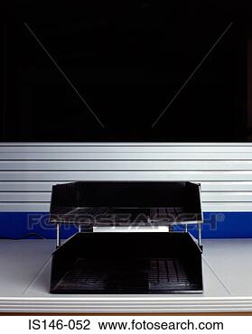 Stock Photo - empty tray on 
desk. fotosearch 
- search stock 
photos, pictures, 
images, and photo 
clipart
