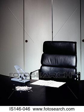 Stock Photo - hole punch on 
desk. fotosearch 
- search stock 
photos, pictures, 
images, and photo 
clipart