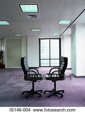 Stock Photo - pair of empty 
office chairs. 
fotosearch - search 
stock photos, 
pictures, images, 
and photo clipart