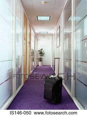 Stock Photography - suitcase in office 
corridor. fotosearch 
- search stock 
photos, pictures, 
images, and photo 
clipart