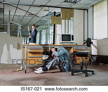 Stock Photography - businessman hiding 
from colleague's 
attack. fotosearch 
- search stock 
photos, pictures, 
images, and photo 
clipart