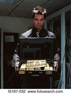 Stock Photo - man with briefcase 
of gold bars. 
fotosearch - search 
stock photos, 
pictures, images, 
and photo clipart