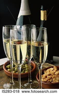 Stock Photo - glasses of cava 
and snacks. fotosearch 
- search stock 
photos, pictures, 
images, and photo 
clipart