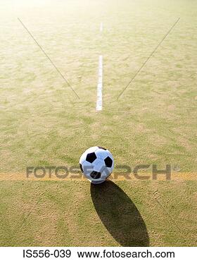 Stock Photograph - football on astroturf 
field. fotosearch 
- search stock 
photos, pictures, 
images, and photo 
clipart