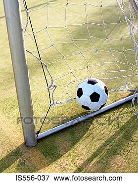 Picture - football in goal. 
fotosearch - search 
stock photos, 
pictures, images, 
and photo clipart