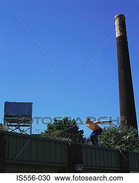 Stock Photography - gymnast on garage 
roof. fotosearch 
- search stock 
photos, pictures, 
images, and photo 
clipart