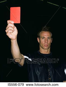 Stock Photograph - referee holding 
a red card. fotosearch 
- search stock 
photos, pictures, 
images, and photo 
clipart