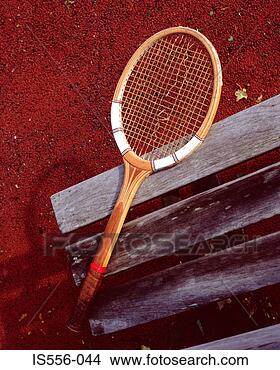 Stock Photo - tennis racket 
on bench. fotosearch 
- search stock 
photos, pictures, 
images, and photo 
clipart