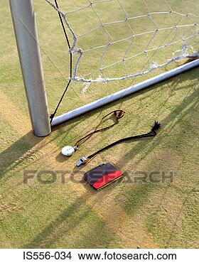 Stock Photo - whistle and stop 
watch in goal. 
fotosearch - search 
stock photos, 
pictures, images, 
and photo clipart