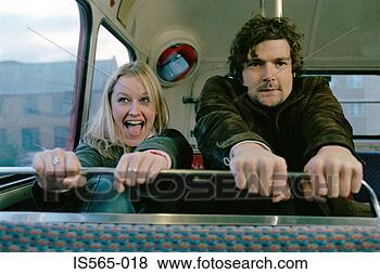 Stock Photo - couple grasping 
bus seat. fotosearch 
- search stock 
photos, pictures, 
images, and photo 
clipart