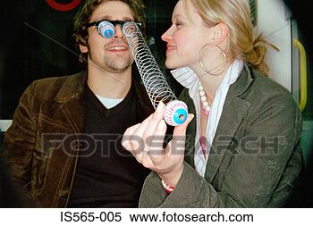Stock Image - couple playing 
on subway train. 
fotosearch - search 
stock photos, 
pictures, images, 
and photo clipart